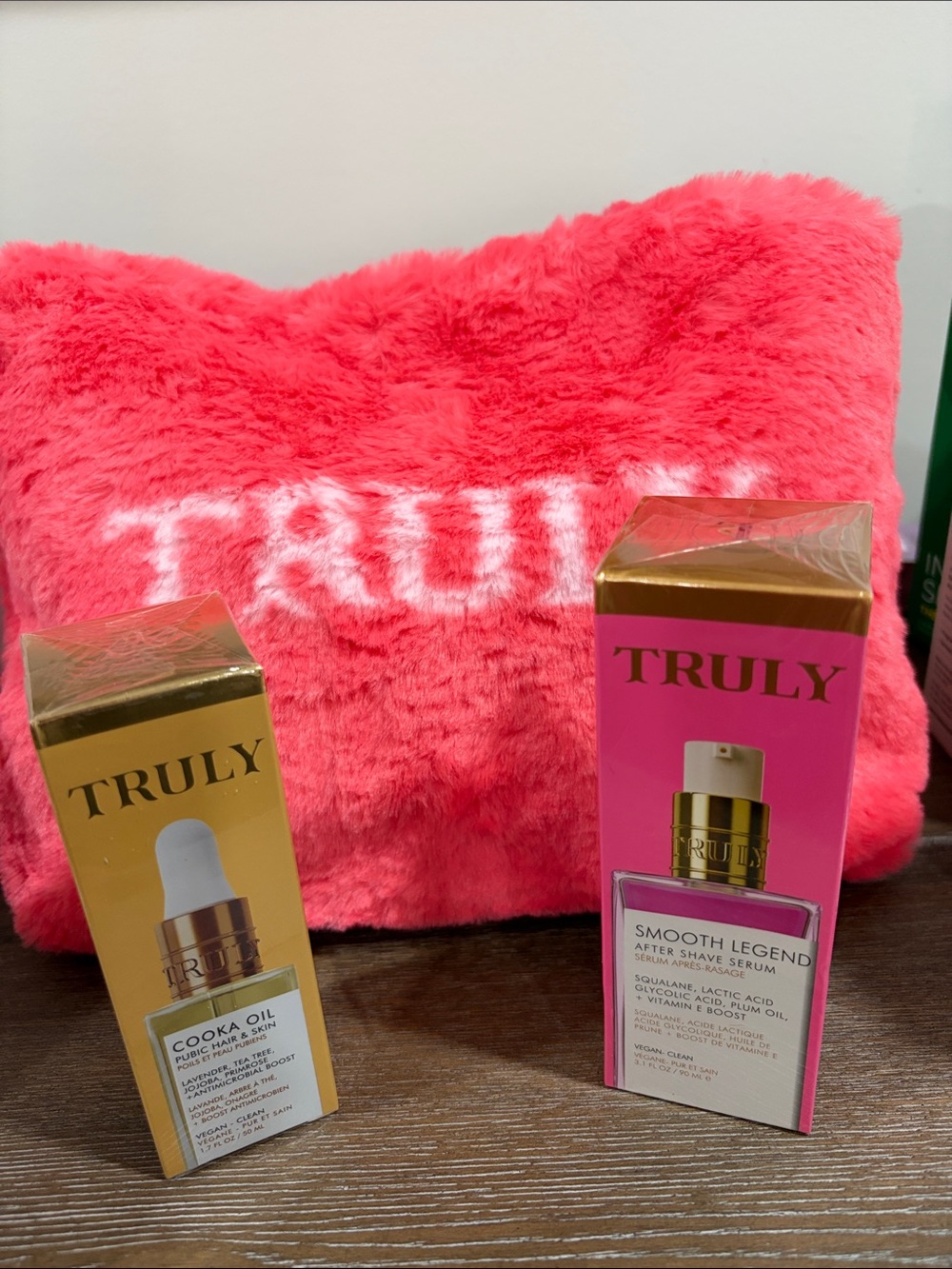 TRULY Pink Faux Fur Bag with Cooka Oil and Smooth Legend After Shave Serum. NEW
